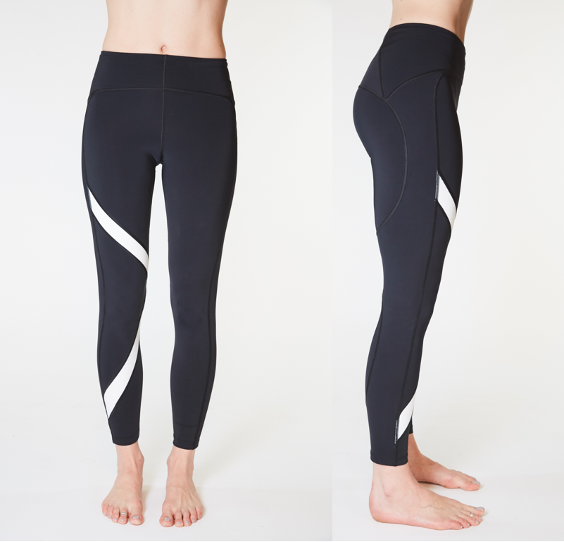 Black leggings with white stripes on a white background