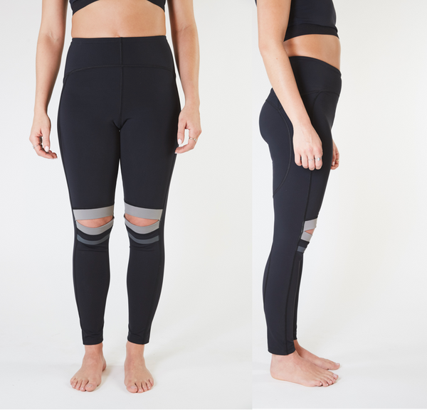 Black leggings with open knees on a white background